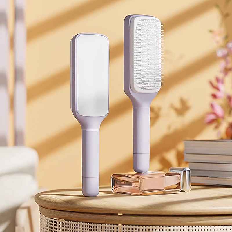 Brosse à cheveux autonettoyante