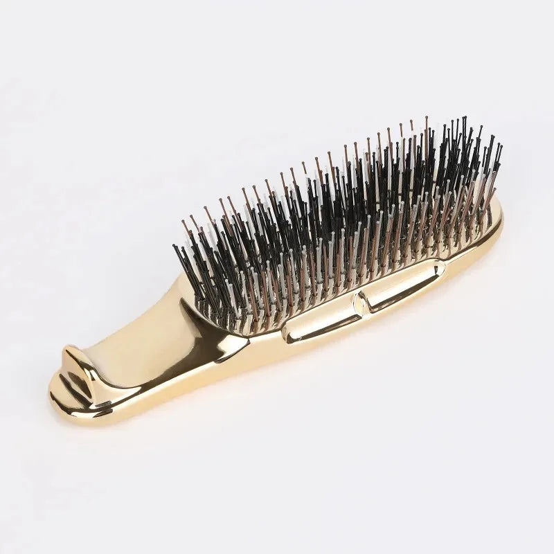 Brosse à cheveux or