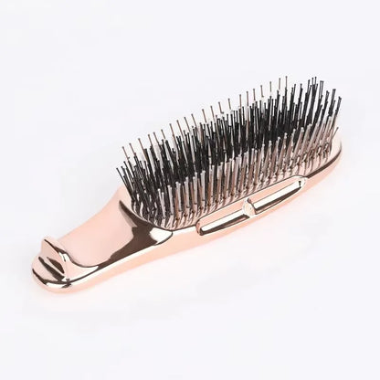 Brosse à cheveux  rose or