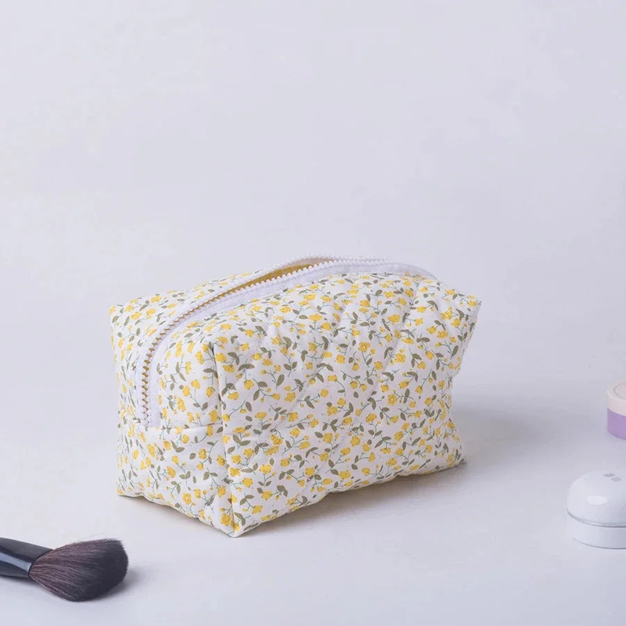 Trousse maquillage fleur jaune