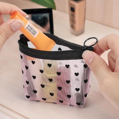 Trousses_maquillages_rose_au_coeur_noir